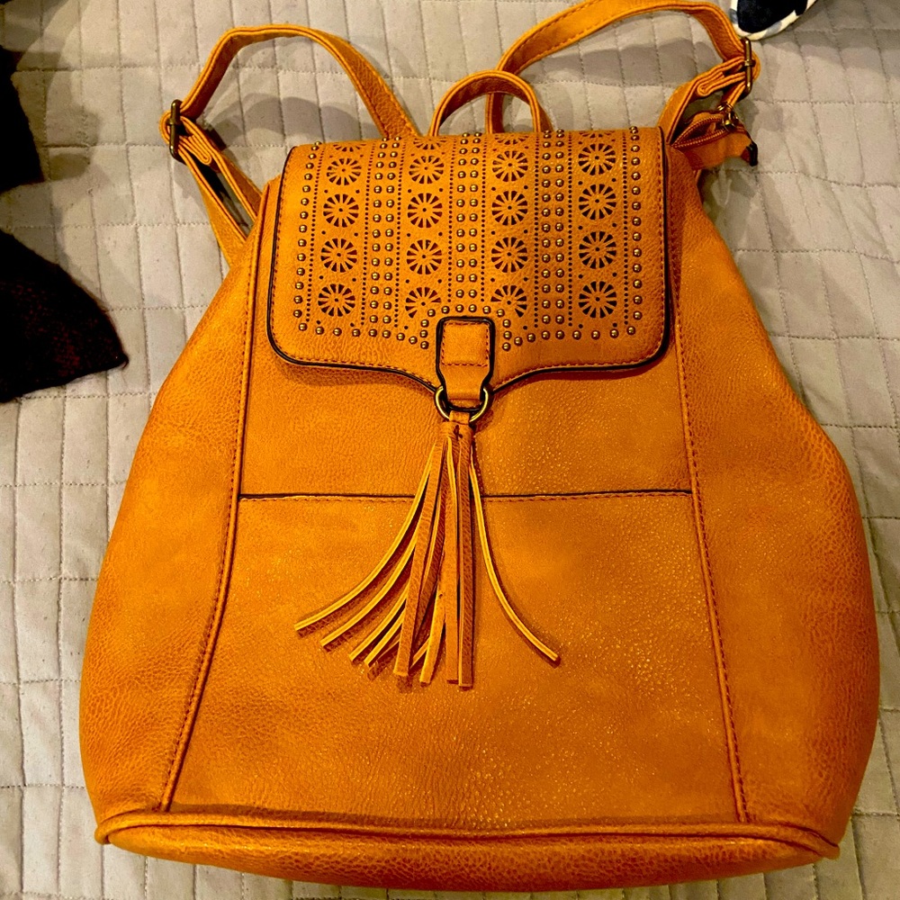 Cognac/Tan faux leather backpack purse NWOT and never carried. Smoke free home